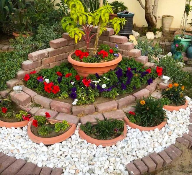 Terracotta Layers Bursting Crimson Blooms