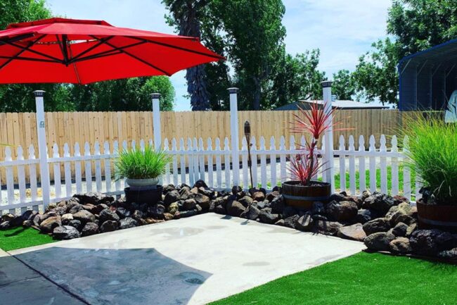 Orange Umbrella Sparks Concrete Oasis