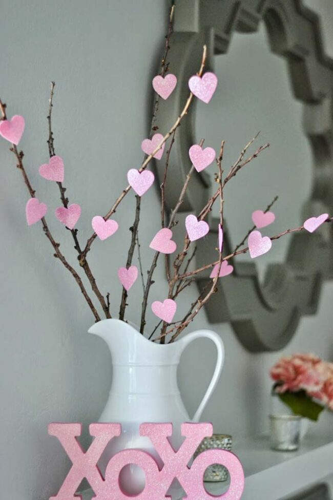 Crimson Hearts Suspended on Branches