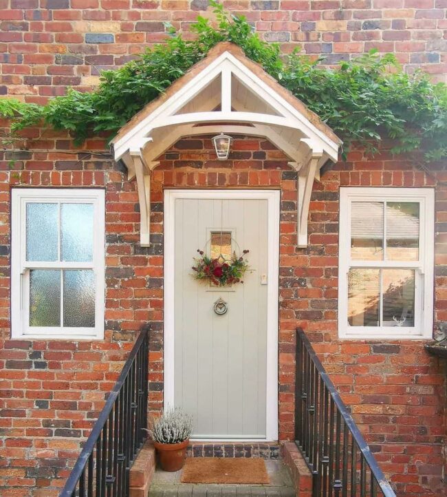 Ivy-Crowned Cream Door Entrance