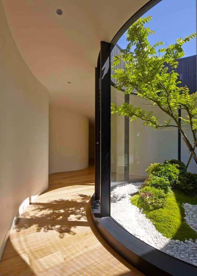 Green Sanctuary Behind Crystal Glass Wall