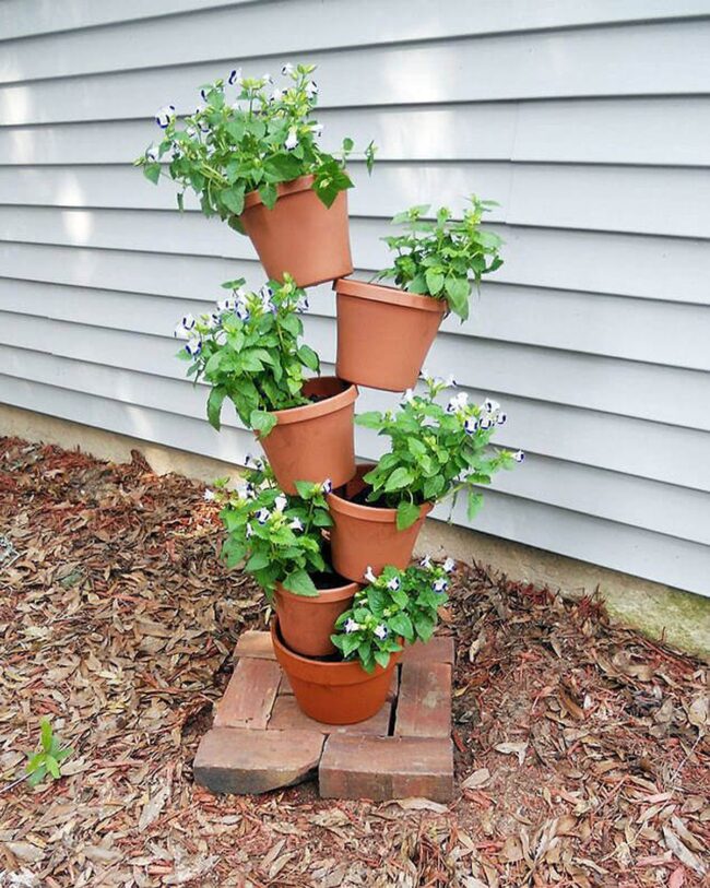 Tilting Terracotta Garden Towers