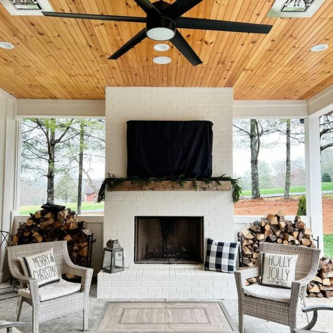 White Brick Fireplace Anchors Outdoor Sanctuary