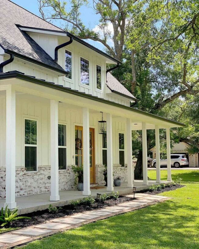 Crisp White Porch Meets Dark Lantern