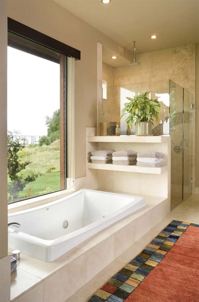 Verdant Window Bath Overlooking Landscape