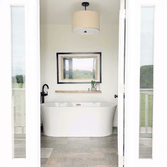 White Oval Tub Sanctuary Gray Floors