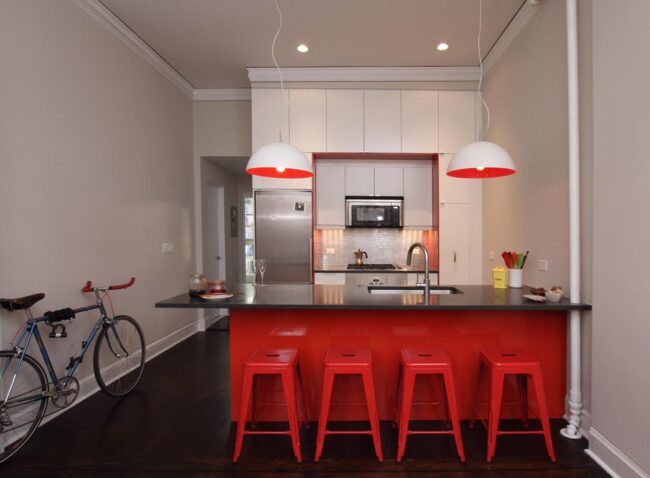 Red Stools Punctuate Kitchen Design