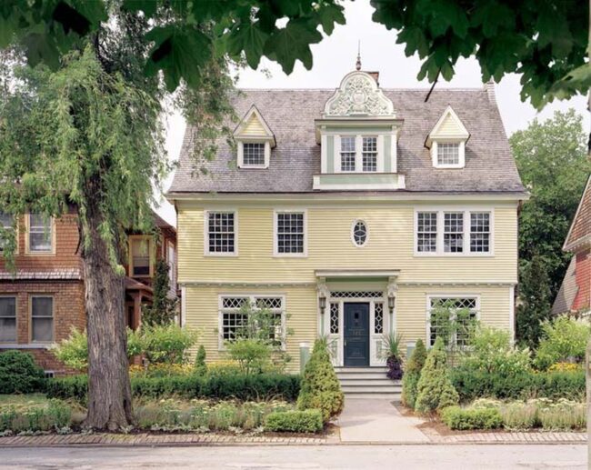 Navy Confidence: Yellow House Entrance