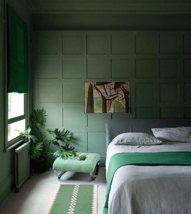 Dark Green Paneling Transforms Sophisticated Space