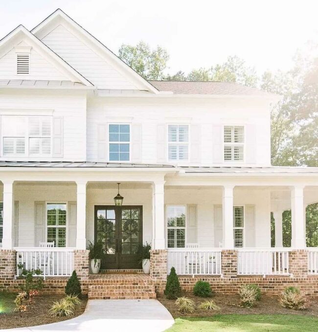 White Columns Black Lantern Brick Gateway