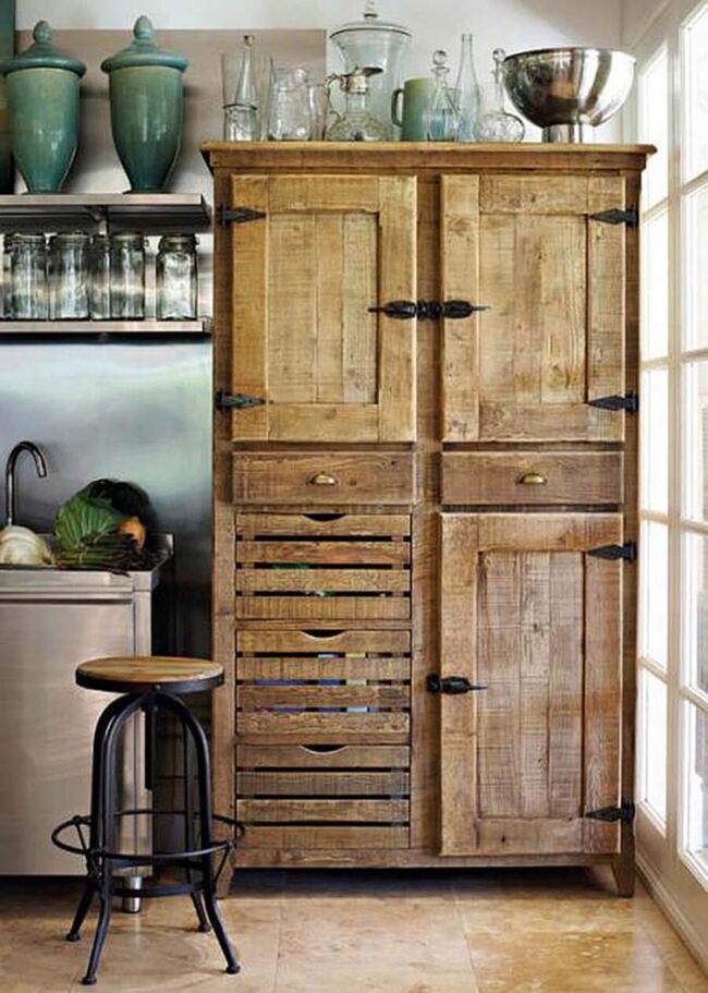 Weathered Wood Armoire Anchors Kitchen