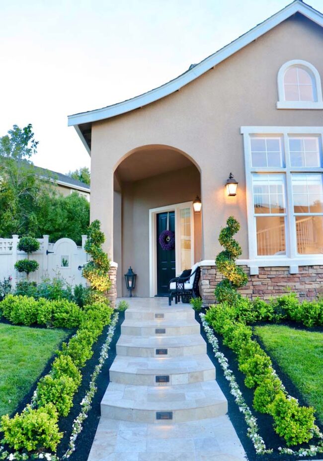 Green Geometric Hedge Frames Stone Entrance