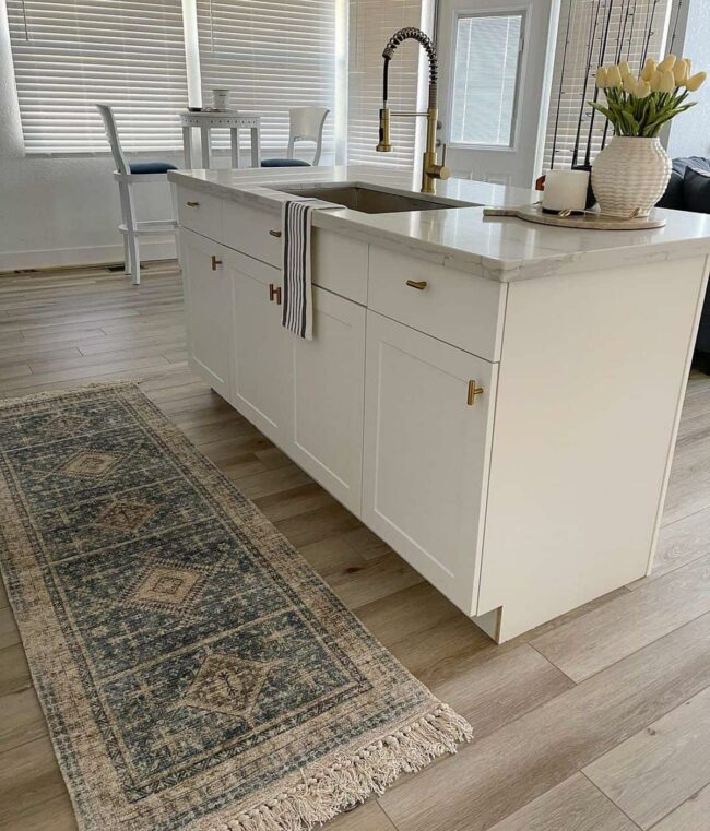 Luminous Brass Whispers Timeless Kitchen