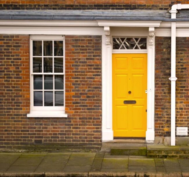 Sunshine Yellow Door Greets Neighbors