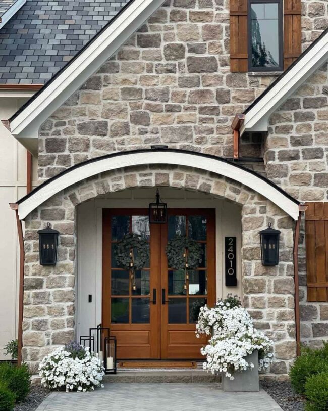 Verdant Wreaths Embrace Stone Sanctuary