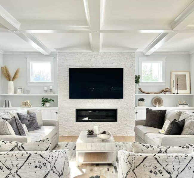 White Shelves Sculpt Dramatic Stone Fireplace