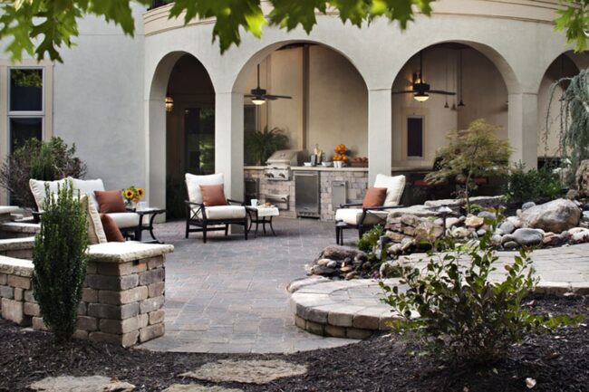 Sunlit Stone Patio Entertains Endlessly