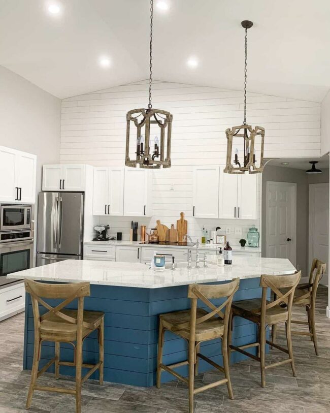 Blue Shiplap Island Anchors Inviting Kitchen
